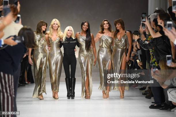 Carla Bruni, Claudia Schiffer, Donatella Versace, Naomi Campbell, Cindy Crawford and Helena Christensen walk the runway at the Versace show during...