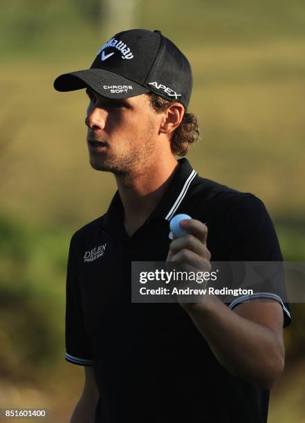 Thomas Pieters of Belgium acknowledges the crowd on the 18th green during day two of the Portugal Masters at Dom Pedro Victoria Golf Club on...