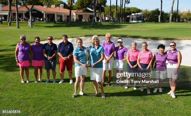 Kym Larratt and Trish Formoy of Kibworth Golf Club winners of the WPGA Lombard Trophy Grand Final pose with all the competitors during The WPGA...