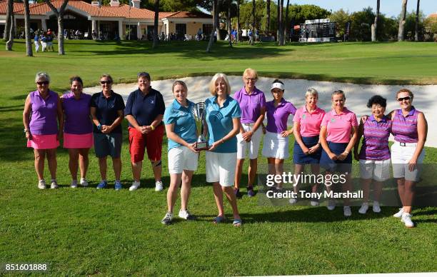 Kym Larratt and Trish Formoy of Kibworth Golf Club winners of the WPGA Lombard Trophy Grand Final pose with all the competitors during The WPGA...