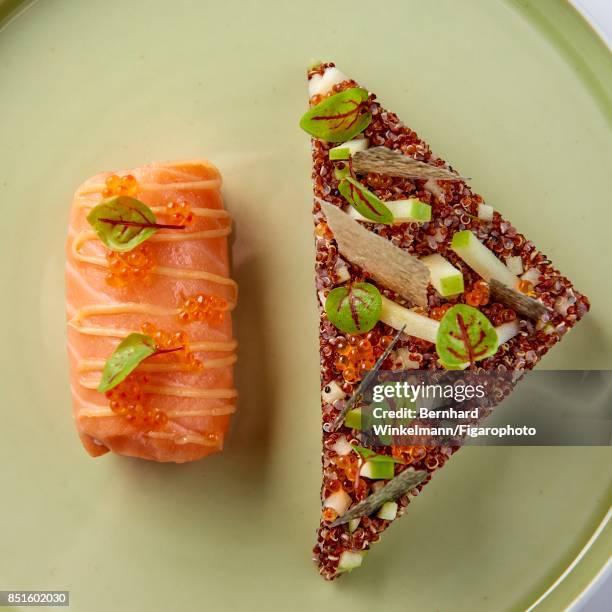 Salmon and granny-smith apple risotto of quinoa from the Brasserie dAumont at the Crillon Hotel are photographed for Madame Figaro on August 28, 2017...