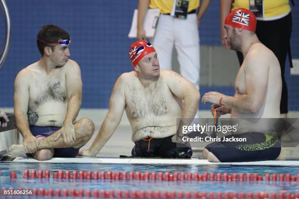 Athletes sit near the pool during a pre Invictus Games training session at Pan Am Sports Centre on September 22, 2017 in Toronto, Canada.