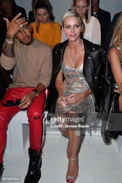Lewis Hamilton and Charlene Wittstock attend the Versace show during Milan Fashion Week Spring/Summer 2018 on September 22, 2017 in Milan, Italy.