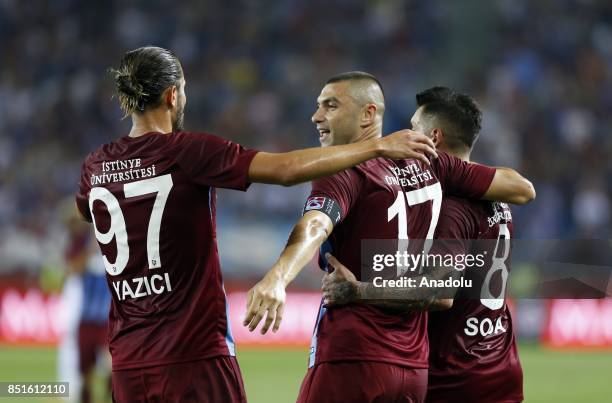 Burak Yilmaz of Trabzonspor celebrates with his teammates after scoring during the Turkish Super Lig week 6 soccer match between Trabzonspor and...