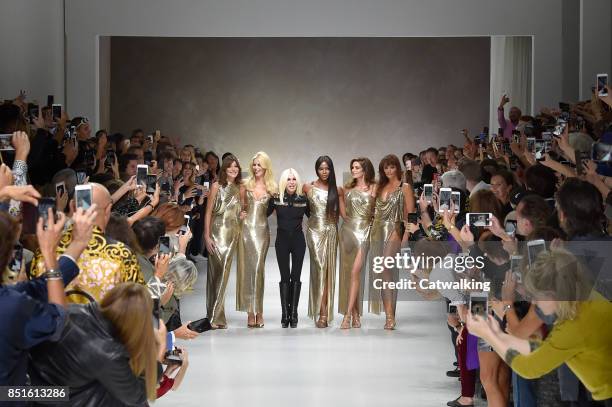 Fashion designer Donatella Versace with Supermodels L-R, Carla Bruni, Claudia Schiffer, Naomi Campbell, Cindy Crawford, Helena Christensen, walk the...