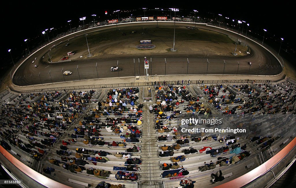 Texas Dirt Track Racing 32 FEBRUARY 28 - Dirt track racing fans fill the grand stands February ...