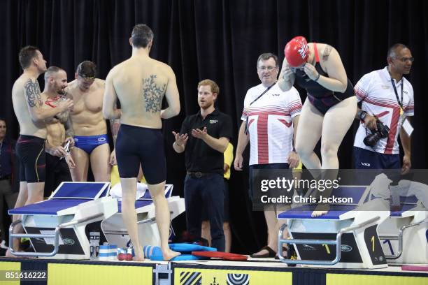 Prince Harry watches athletes work during a pre Invictus Games training session at Pan Am Sports Centre on September 22, 2017 in Toronto, Canada.