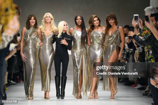 Carla Bruni, Claudia Schiffer, Donatella Versace, Naomi Campbell, Cindy Crawford and Helena Christensen walk the runway at the Versace show during...