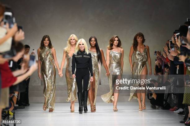 Carla Bruni, Claudia Schiffer, Donatella Versace, Naomi Campbell, Cindy Crawford and Helena Christensen walk the runway at the Versace show during...