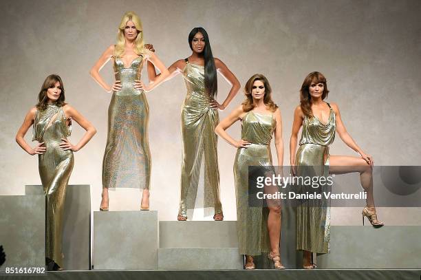 Carla Bruni, Claudia Schiffer, Naomi Campbell, Cindy Crawford and Helena Christensen walk the runway at the Versace show during Milan Fashion Week...