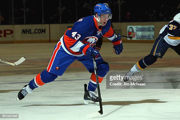 Andrew MacDonald of the New York Islanders skates against the Buffalo Sabres on February 28, 2009 at Nassau Coliseum in Uniondale, New York. The...