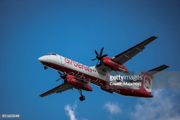 An airplane operated by German airline 'air berlin' comes in for landing at Tegel airport in Berlin on September 22, 2017 in Berlin, Germany.