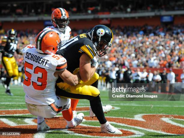 Tight end Jesse James of the Pittsburgh Steelers catches a touchdown pass in the second quarter of a game on September 10, 2017 against the Cleveland...