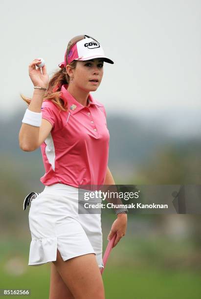 Paula Creamer of USA celebrates after putting on the 9th hole during day four of the Honda LPGA Thailand 2009 at Siam Country Club Plantation on...