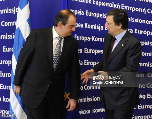 European Commission President Jose Manuel Barroso welcomes Greece's Prime Minister Costas Karamanlis for a meeting on March 1, 2009 before an...