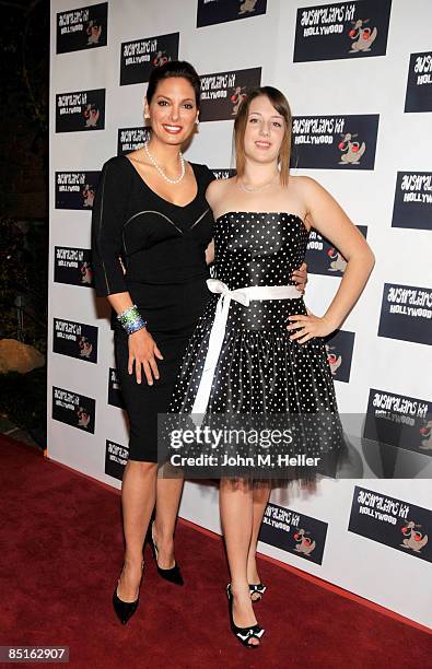 Alex Meneses, Executive Producer "Australians Hit Hollywood" and Annie Meneses attend the World Premiere Screening of the documentary film...