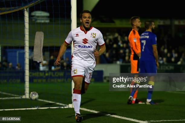 Ryan Seager of MK Dons celebrates after scoring his sides first goal during the Sky Bet League One match between A.F.C. Wimbledon and Milton Keynes...