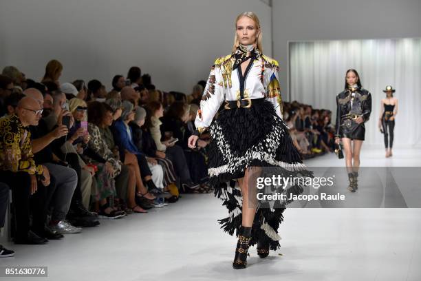 Natasha Poly walks the runway at the Versace show during Milan Fashion Week Spring/Summer 2018 on September 22, 2017 in Milan, Italy.