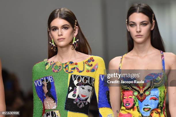 Kaia Gerber; andVittoria Ceretti walk the runway at the Versace show during Milan Fashion Week Spring/Summer 2018 on September 22, 2017 in Milan,...