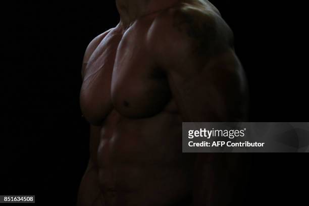 Participant waits for his turn to perform at the fitness and bodybuilding Arnold Classic Europe event in L'Hospitalet del Llobregat on September 22,...
