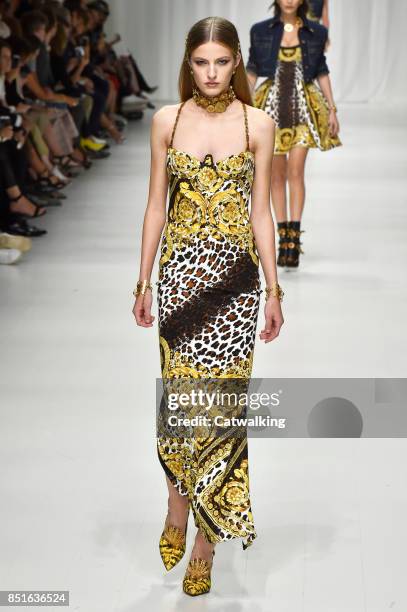 Model walks the runway at the Versace Spring Summer 2018 fashion show during Milan Fashion Week on September 22, 2017 in Milan, Italy.