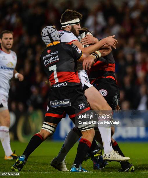 Belfast, United Kingdom - 22 September 2017; Stuart McCloskey of Ulster is tackled by Ollie Griffiths and Robson Blake of Dragons during the Guinness...