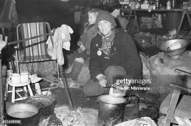 Mary Millington one of the Greenham Common Women's Peace Camp protesters, seen here preparing dinner. The women are protesting against the decision...