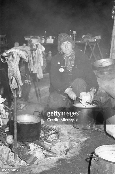 Mary Millington one of the Greenham Common Women's Peace Camp protesters, seen here preparing dinner. The women are protesting against the decision...