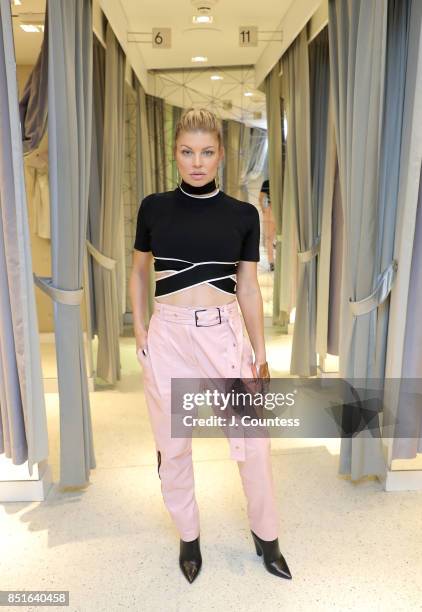 Singer Fergie poses for a photo during her visit to "Extra" at their New York Studios at H&M Times Square on September 22, 2017 in New York City.
