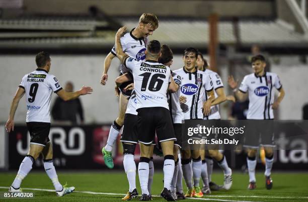 Louth , Ireland - 22 September 2017; Steven Kinsella, left, of Dundalk celebrates with teammates after scoring his side's first goal of the game...