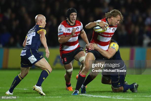 Billy Twelvetrees of Gloucester is held up during the Aviva Premiership match between Gloucester Rugby and Worcester Warriors at Kingsholm Stadium on...