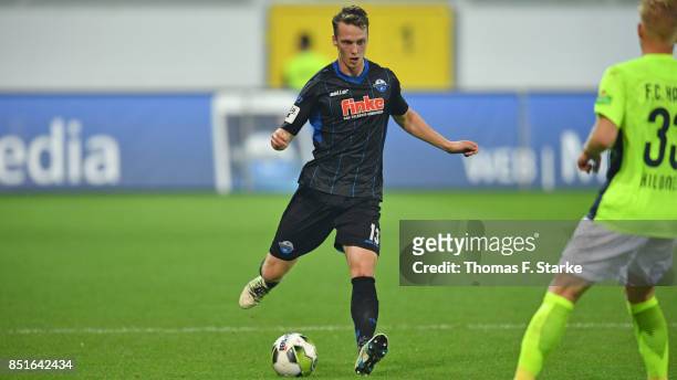 Sebastian Schonlau of Paderborn runs with the ball during the 3. Liga match between SC Paderborn 07 and F.C. Hansa Rostock at Benteler Arena on...