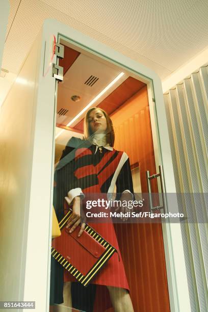 Model Kersti Pohlak poses at a fashion shoot for Madame Figaro on July 22, 2017 in Paris, France. Dress , sweater , necklace , clutch . PUBLISHED...