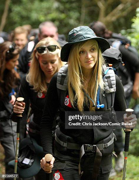 Fearne Cotton and Denise Van Outen trek through the rainforest on the first day of The BT Red Nose Climb of Kilimanjaro on March 1, 2009 in Arusha,...