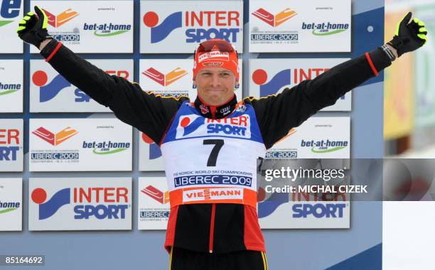 Tobias Angerer of Germany celebrates his third place at the podium after the Men's 50Km Mass Start Free event of the Nordic Skiing World...