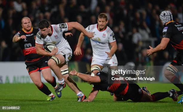 Belfast, United Kingdom - 22 September 2017; Nick Timoney of Ulster escapes the tackle of Rynard Landman of Dragons en route to scoring his sides 7th...