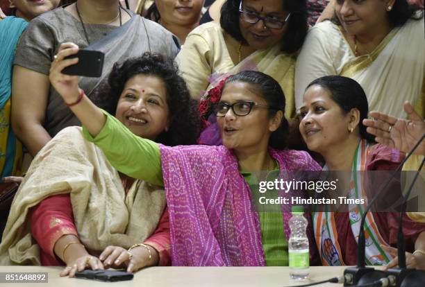 Silchar MP Sushmita Dev takes a selfie with Sharmistha Mukherjee and Shobha Oza after taking charge of President of Mahila Congress at AICC on...