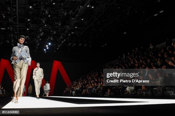 Model walks the runway at the Giorgio Armani show during Milan Fashion Week Spring/Summer 2018 on September 22, 2017 in Milan, Italy.