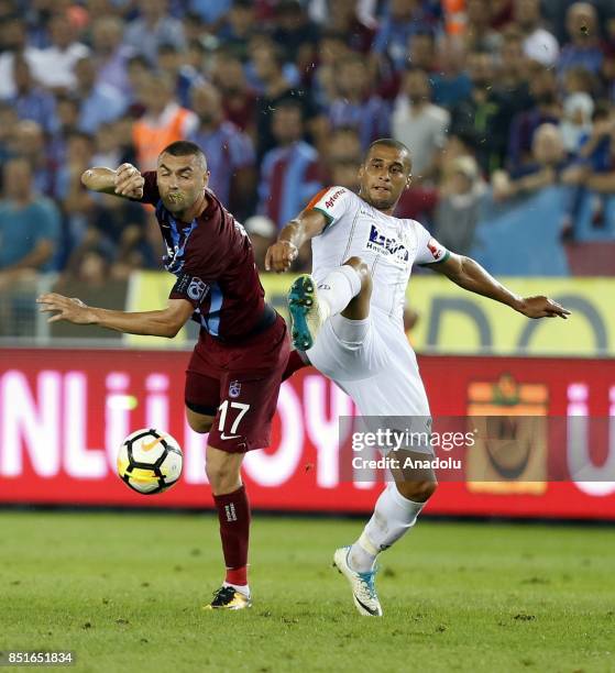 Burak Yilmaz of Trabzonspor in action against Souza Silva of Aytemiz Alanyaspor during the Turkish Super Lig week 6 soccer match between Trabzonspor...