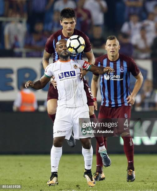 Okay Yokuslu of Trabzonspor in action against Vagner Silva of Aytemiz Alanyaspor during the Turkish Super Lig week 6 soccer match between Trabzonspor...