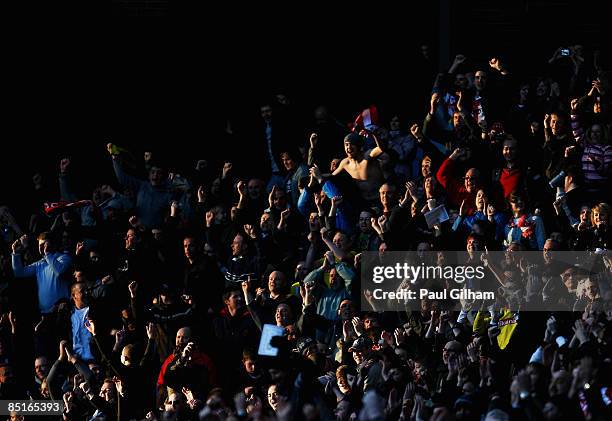 Stoke City fans celebrate on the final whistle after drawing 2-2 in the Barclays Premier League match between Aston Villa and Stoke City at Villa...