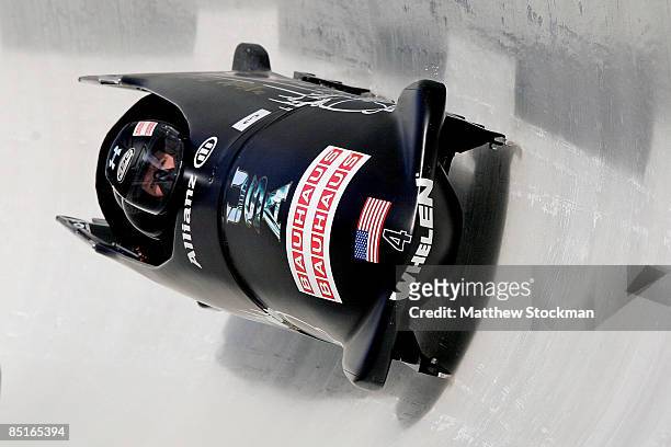 Piloted by Steven Holcomb, compete in the third run of the the four man competition during the FIBT Bobsled World Championships at the Olympic...