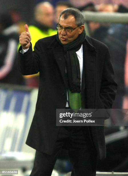 Head coach Felix Magath of Wolfsburg gestures during the Bundesliga match between Hamburger SV and VFL Wolfsburg at the HSH Nordbank Arena on March...