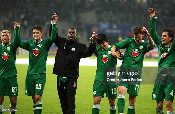 Grafite of Wolfsburg celebrates with his team mates after the Bundesliga match between Hamburger SV and VFL Wolfsburg at the HSH Nordbank Arena on...