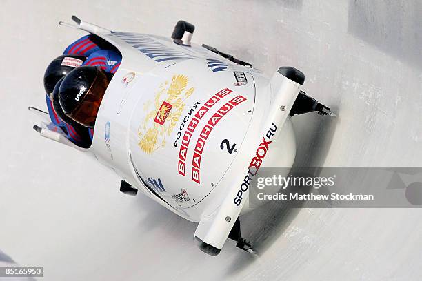 Russia 1, piloted by Alexsandr Zubkov, competes in the third run of the the four man competition during the FIBT Bobsled World Championships at the...