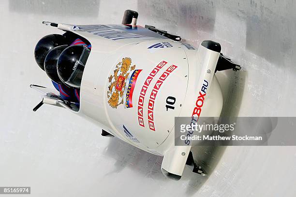 Russia 2, piloted by Dmitry Abramovitch, competes in the third run of the the four man competition during the FIBT Bobsled World Championships at the...