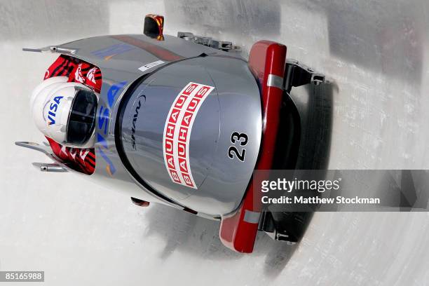 Canada 2, piloted by Lyndon Rush, competes in the third run of the the four man competition during the FIBT Bobsled World Championships at the...