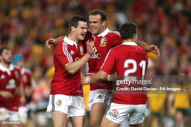 British and Irish Lions' Jamie ROberts celebrates scoring a try with team-mates Jonathan Sexton and Conor Murray