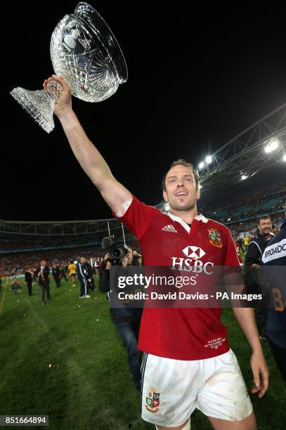 British and Irish Lions captain Alun-Wyn Jones celebrates with the trophy, after the game