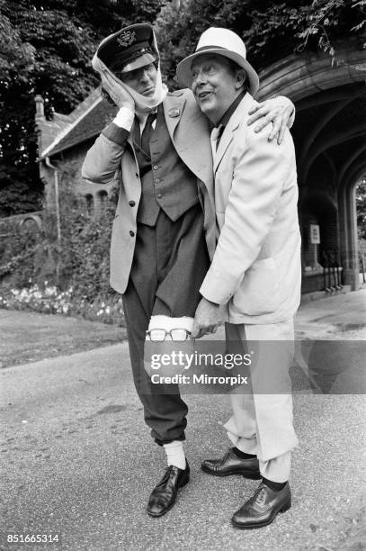 Eric Morecambe and Tom Baker on location at Hever Castle, where they are making a comedy film, 18th August 1982.